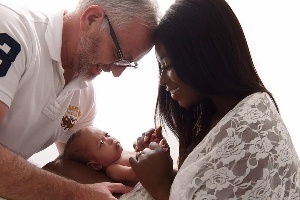 Yvonne Okyere-Whalley with her baby, husband
