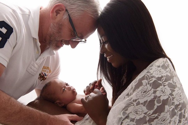 Yvonne Okyere-Whalley with her baby, husband