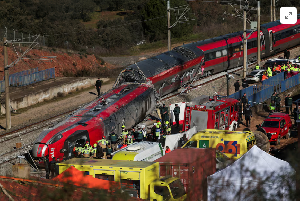 Members of the Spanish Civil Guard, along with other emergency personnel