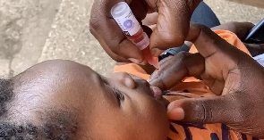 A child receiving a polio vaccine