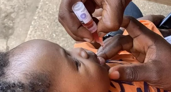 A child receiving a polio vaccine