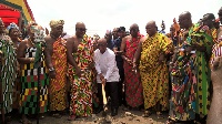 Volta Regional Minister cutting sod with assistants from some Kpetoe Chiefs