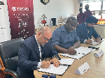 Officials of NITA, Trend Micro, and Smart Infraco signing the agreement
