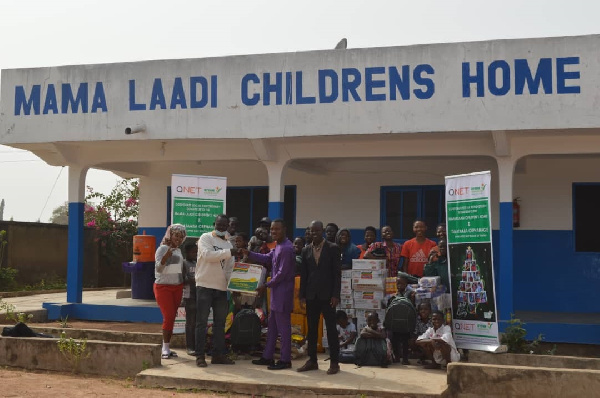 Officials of QNet making a presentation to one of the orphanages