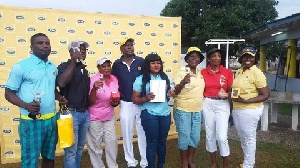 Dick and Avonokye received their prizes to a standing ovation from other golfers