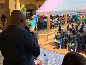 George Andah speaking to the school children of Awutu Senya West