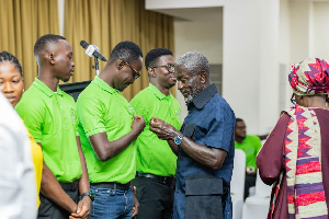 Capt Kofi Amoabeng decorating one of the leaders