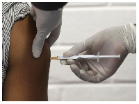 File photo of a patient being vaccinated