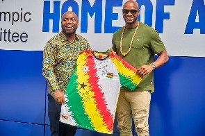 Asafa Powell  durig his tour in Ghana