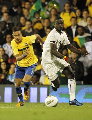 Jonathan Mensah (R) at the Under 20 World Cup in Egypt in 2009