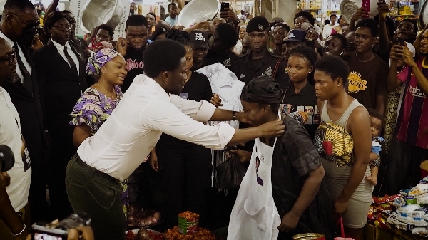 Presidential aspirant, Nana Kwame Bediako, popularly with some of the Market women