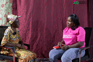 Alice Adjoa Ahiaku sharing her story with a reporter