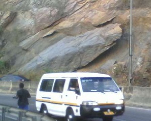 The hanging and falling sedimentary rocks on the Aburi-Accra road pose danger to vehicles