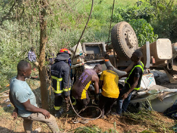 A Howo Sinotruk truck, registered as AS-4114-24, loaded with cement overturned