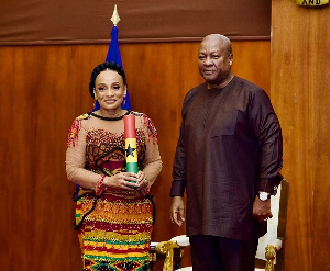 Sabah Zita Benson (L) and President John Dramani Mahama