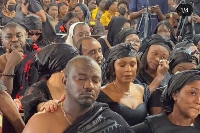 Dumelo with family, sympathisers during mother's burial service