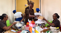 How food prepared for Ghanaian prison inmates is inspected before serving
