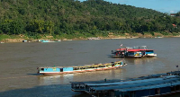 Tens of thousands of tourists annually use slow boat and speedboat services along the Mekong