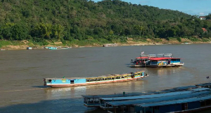 Tens of thousands of tourists annually use slow boat and speedboat services along the Mekong