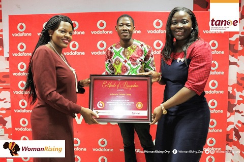 Yolanda Cuba, CEO of Vodafone Ghana (L) receiving her award