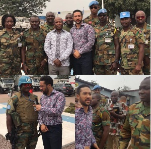 Majid Michel with the military men