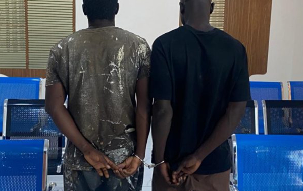 Two suspects have confessed to the killing of a night security guard and 15 others