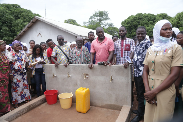 Richard Nyamah with some of the leaders at one of the communities