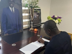 Minister Of Finance Signing On The Book Of Condolences