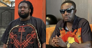 Prophet Ajagurajah (L) says he no longer needs cows from Criss Waddle (R)