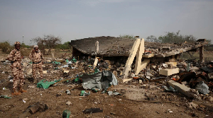 General view of a collapsed building at the scene following a fire at ammunition depot in N'Djamena