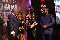Kadijah Amoah, CEO of Pecan Energies receiving the award from President Akufo-Addo
