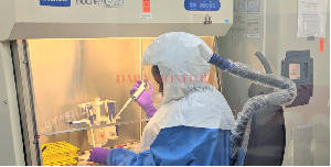 A scientist conducts tests in Viral Hemorrhagic Fever Lab at Uganda Virus Research Institute