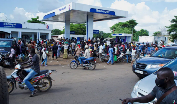 People gather at a petrol station due to shortage of petrol in Bamako, Mali