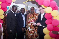 Chief of Bantamaa (middle) with Vivo staff to officially re-open the station