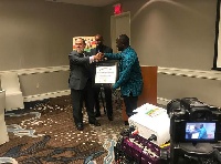 Armah Kofi Buah recieves his award