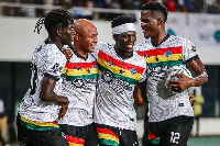 Andre Ayew celebrates with teammates after scoring