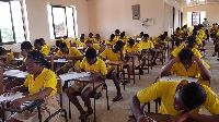 Some students in an examination hall