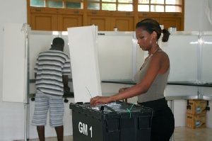 Woman casts her ballot