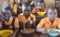 Some students enjoying their school feeding meals