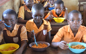 Some students enjoying their school feeding meals