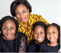 Kwansema Dumor, wife of late Ghanaian prolific broadcaster Komla Dumor and their three children