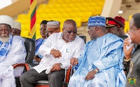 President Akufo-Addo and Vice President Bawumia engaging in a conversation