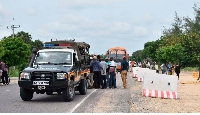 Security officers escort public service vehicles along the volatile Gamba-Witu road in Lamu County