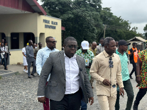 The minister (in brown dress) emphasised the government’s commitment to addressing health concerns