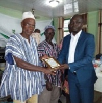 A senior citizen receiving a citation of honour at the event organised by the NYA