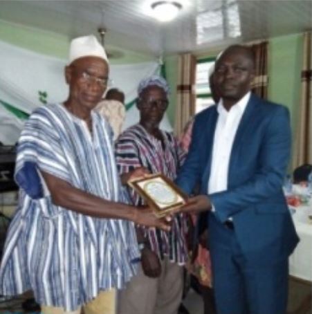 A senior citizen receiving a citation of honour at the event organised by the NYA