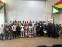 Some of the policymakers, civil society actors and tax experts in a photograph at the event