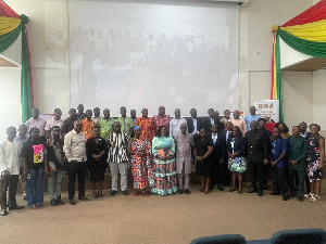 Some of the policymakers, civil society actors and tax experts in a photograph at the event
