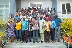 Participants in a group picture at the College of Engineering and Industry Symposium