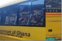 The school bus with the firewood inside.